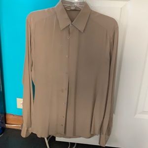 This is a 100% silk long sleeve dress shirt